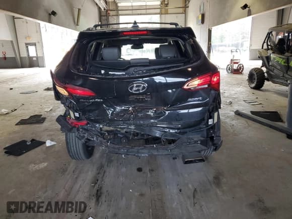 ✅ 2017 Hyundai Santa Fe 2.4L • VIN: 5NMZUDLB2HH012260 • Лот: 41802653. Опубликован ранее на Copart с пробегом 64 811 миль. Бесплатный доступ к архиву аукционных продаж из США и подробный отчёт об истории автомобиля на DreamBid. Изображение 6.
