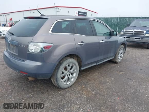 ✅ 2009 Mazda CX-7 Grand Touring • VIN: JM3ER293890217899 • Лот: 41413330. Опубликован ранее на IAAI с пробегом 132 000 миль. Бесплатный доступ к архиву аукционных продаж из США и подробный отчёт об истории автомобиля на DreamBid. Изображение 4.
