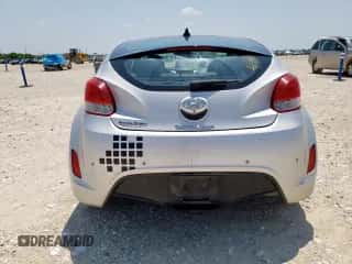 2013 Hyundai Veloster w/Black Int with VIN KMHTC6AD9DU147646, listed as a Copart auction lot 58495585 with 121,781 mi miles and Salvage title. Bid and sale history available at DreamBid. Image 6.