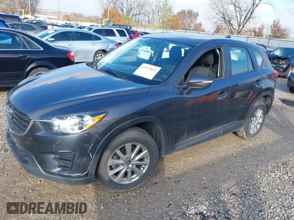 ✅ 2016 Mazda CX-5 Sport • VIN: JM3KE4BY9G0784667 • Lot: 43737851. Listed on IAAI with 151,569 mi. Free auction sales archive from the USA and detailed vehicle history report at DreamBid. Image 2.
