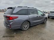 ✅ 2025 Honda Odyssey Touring • VIN: 5FNRL6H83SB011705 • Lot: 94996825. Listed on Copart with 20,690 mi. Free auction sales archive from the USA and detailed vehicle history report at DreamBid. Image 3.