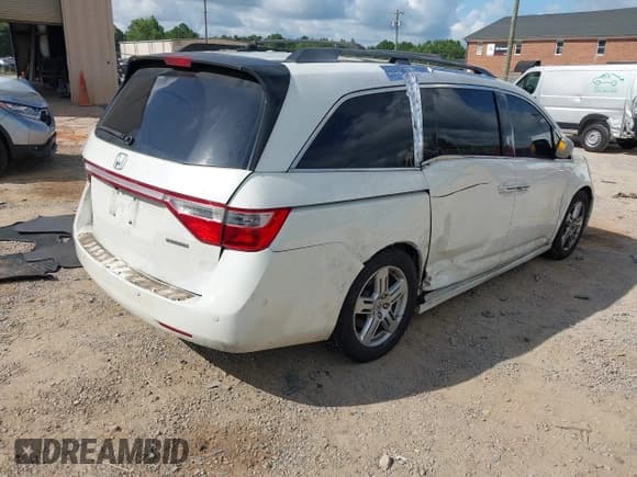 ✅ 2013 Honda Odyssey Touring • VIN: 5FNRL5H97DB012667 • Lot: 42754906. Listed on IAAI with 212,445 mi. Free auction sales archive from the USA and detailed vehicle history report at DreamBid. Image 4.