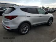 ✅ 2018 Hyundai Santa Fe 2.4L • VIN: 5XYZU3LB7JG517849 • Lot: 93773105. Listed on Copart with 16,936 mi. Free auction sales archive from the USA and detailed vehicle history report at DreamBid. Image 3.