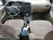 ✅ 1999 Kia Sportage • VIN: KNDJB7232X5612065 • Lot: 47575445. Listed on Copart with 77,486 mi. Free auction sales archive from the USA and detailed vehicle history report at DreamBid. Image 8.