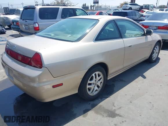 2001 Honda Accord EX z VIN 1HGCG225X1A001991, wystawiony jako IAAI lot #42386629 z przebiegiem 224 553 mil mil oraz . Historia ofert i sprzedaży dostępna na DreamBid. Obrazek 4.