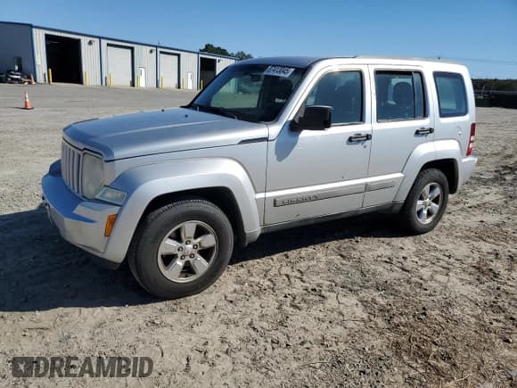 ✅ 2012 Jeep Liberty Sport Latitude • VIN: 1C4PJLAK0CW122338 • Lot: 87413045. Listed on Copart with 292,419 mi. Free auction sales archive from the USA and detailed vehicle history report at DreamBid. Image 1.