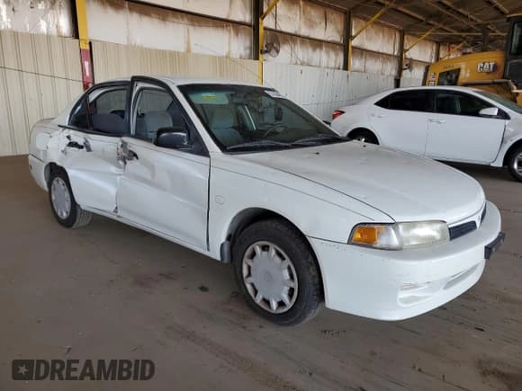 ✅ 2001 Mitsubishi Mirage ES • VIN: JA3AY26CX1U013535 • Lot: 57664885. Listed on Copart with 159,095 mi. Free auction sales archive from the USA and detailed vehicle history report at DreamBid. Image 4.