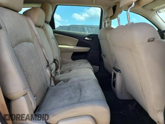 2012 Dodge Journey American Value z VIN 3C4PDCAB9CT353221, wystawiony jako Copart lot #83983955 z przebiegiem 312 681 mil mil oraz Szkoda całkowita • Salvage title. Historia ofert i sprzedaży dostępna na DreamBid. Obrazek 11.