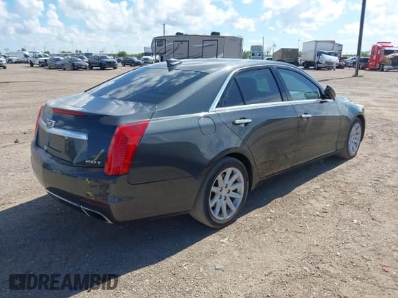 ✅ 2015 Cadillac CTS Luxury RWD • VIN: 1G6AR5SXXF0117520 • Lot: 42597659. Wystawiony na IAAI z przebiegiem 148 298 mil. Bezpłatny archiwum sprzedaży aukcyjnych z USA i szczegółowy raport historii pojazdu na DreamBid. Zdjęcie 4.