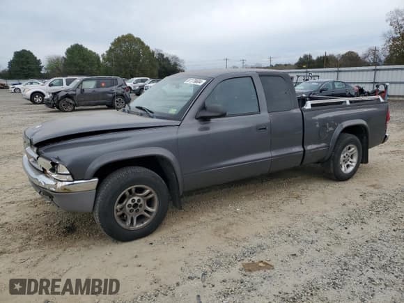 ✅ 2004 Dodge Dakota SLT • VIN: 1D7GL42N34S717286 • Lot: 81179604. Listed on Copart with 166,893 mi. Free auction sales archive from the USA and detailed vehicle history report at DreamBid. Image 1.