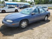 ✅ 1997 Chevrolet Lumina • VIN: 2G1WL52M6V9153339 • Лот: 67913684. Опубликован ранее на Copart с пробегом 96 470 миль. Бесплатный доступ к архиву аукционных продаж из США и подробный отчёт об истории автомобиля на DreamBid. Изображение 1.