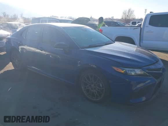 2023 Toyota Camry SE with VIN 4T1G11BK5PU105423, listed as a IAAI auction lot 41414587 with 38,527 mi miles and . Bid and sale history available at DreamBid. Image 1.