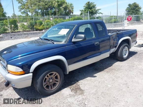 2003 Dodge Dakota SLT with VIN 1D7HL42N83S256346, listed as a IAAI auction lot 42454110 with 75,961 mi miles and . Bid and sale history available at DreamBid. Image 2.