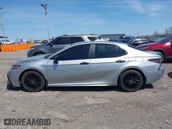 2021 Toyota Camry SE with VIN 4T1G11BK3MU026604, listed as a IAAI auction lot 42000560 with 104,453 mi miles and . Bid and sale history available at DreamBid. Image 14.