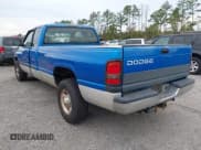 ✅ 2000 Dodge 2500 • VIN: 3B7KC2362YG140005 • Lot: 43786623. Listed on IAAI with 244,100 mi. Free auction sales archive from the USA and detailed vehicle history report at DreamBid. Image 3.