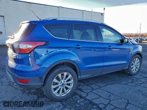 ✅ 2017 Ford Escape Titanium • VIN: 1FMCU9J99HUE98024 • Lot: 93474425. Listed on Copart with 86,014 mi. Free auction sales archive from the USA and detailed vehicle history report at DreamBid. Image 3.