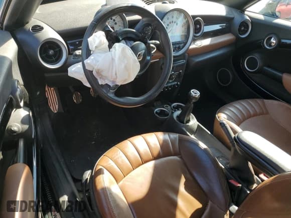 ✅ 2013 MINI Coupe S • VIN: WMWSX3C54DT409066 • Lot: 49877695. Listed on Copart with 109,654 mi. Free auction sales archive from the USA and detailed vehicle history report at DreamBid. Image 8.