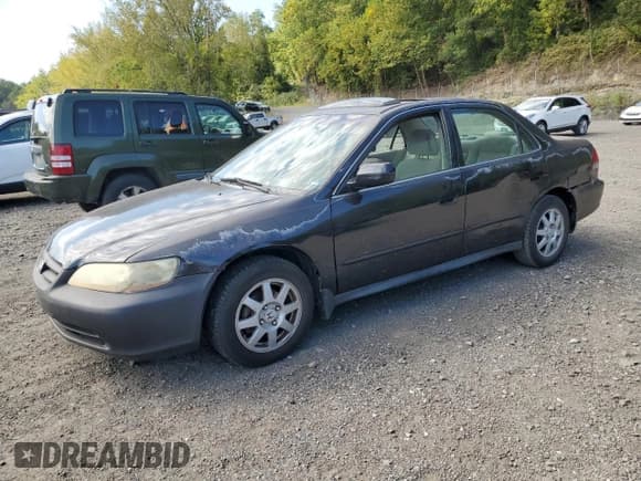 ✅ 2002 Honda Accord SE • VIN: 1HGCG56722A157974 • Lot: 71548755. Listed on Copart with 261,809 mi. Free auction sales archive from the USA and detailed vehicle history report at DreamBid. Image 1.