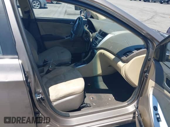 2014 Hyundai Accent GLS with VIN KMHCT4AE8EU655136, listed as a IAAI auction lot 42797016 with 102,554 mi miles and . Bid and sale history available at DreamBid. Image 5.