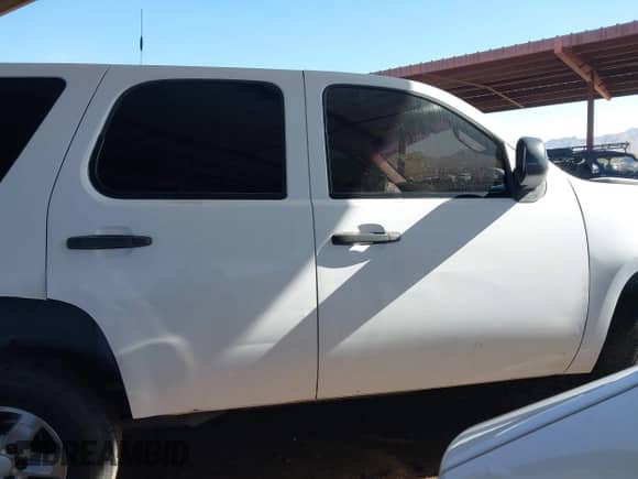 2011 Chevrolet Tahoe Commercial with VIN 1GNSK2E09BR200100, listed as a IAAI auction lot 41721798 with 143,557 mi miles and . Bid and sale history available at DreamBid. Image 13.