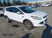 ✅ 2013 Ford Escape SE • VIN: 1FMCU9GX9DUC87292 • Lot: 43837293. Listed on IAAI with 140,103 mi. Free auction sales archive from the USA and detailed vehicle history report at DreamBid. Image 1.