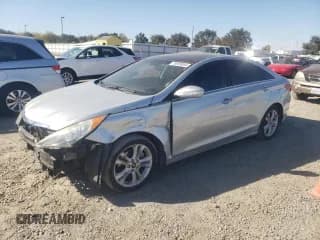 ✅ 2013 Hyundai Sonata SE • VIN: 5NPEC4AC2DH538320 • Lot: 76989084. Listed on Copart with 197,136 mi. Free auction sales archive from the USA and detailed vehicle history report at DreamBid. Image 1.