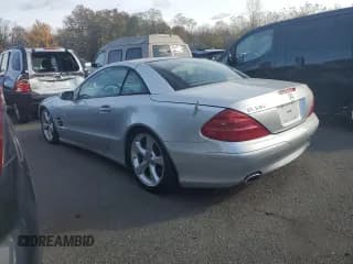 ✅ 2004 Mercedes-Benz SL 500 • VIN: WDBSK76F04F071904 • Лот: 82761125. Опубликован ранее на Copart с пробегом Не указан. Бесплатный доступ к архиву аукционных продаж из США и подробный отчёт об истории автомобиля на DreamBid. Изображение 2.