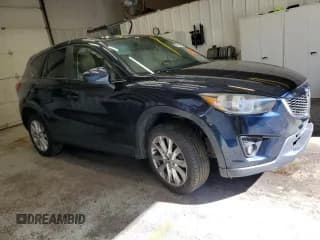 ✅ 2014 Mazda CX-5 Grand Touring • VIN: JM3KE4DY1E0416607 • Lot: 85746505. Listed on Copart with 87,413 mi. Free auction sales archive from the USA and detailed vehicle history report at DreamBid. Image 4.