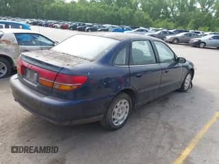 ✅ 2001 Saturn L • VIN: 1G8JT54F21Y557142 • Лот: 42192882. Опубликован ранее на IAAI с пробегом Не указан. Бесплатный доступ к архиву аукционных продаж из США и подробный отчёт об истории автомобиля на DreamBid. Изображение 4.