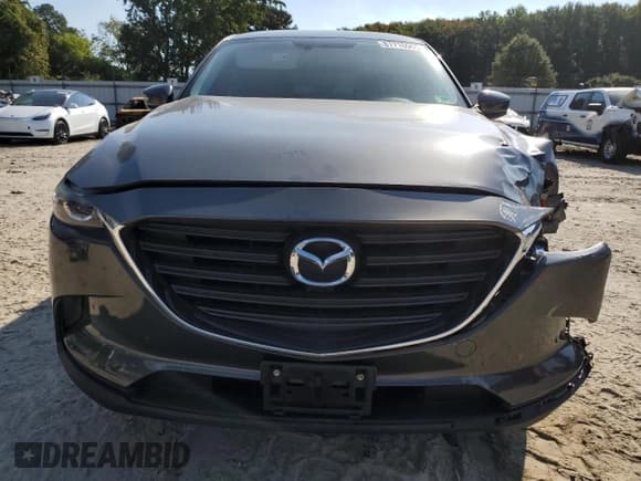 ✅ 2016 Mazda CX-9 Sport • VIN: JM3TCABY1G0109968 • Lot: 81716965. Listed on Copart with 106,878 mi. Free auction sales archive from the USA and detailed vehicle history report at DreamBid. Image 5.