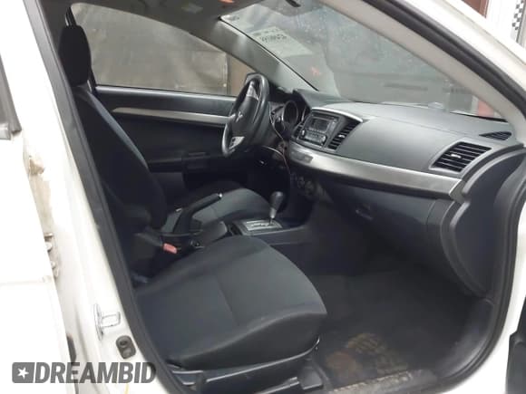 ✅ 2014 Mitsubishi Lancer ES • VIN: JA32U2FU2EU019862 • Lot: 42496155. Listed on IAAI with 128,126 mi. Free auction sales archive from the USA and detailed vehicle history report at DreamBid. Image 5.