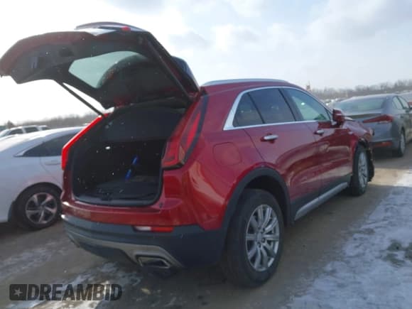 ✅ 2021 Cadillac XT4 FWD Premium Luxury • VIN: 1GYFZCR44MF019607 • Лот: 41363064. Опубликован ранее на IAAI с пробегом 24 364 миль. Бесплатный доступ к архиву аукционных продаж из США и подробный отчёт об истории автомобиля на DreamBid. Изображение 4.
