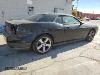 ✅ 2009 Dodge Challenger R/T • VIN: 2B3LJ54T29H602856 • Lot: 82229284. Wystawiony na Copart z przebiegiem 355 225 mil. Bezpłatny archiwum sprzedaży aukcyjnych z USA i szczegółowy raport historii pojazdu na DreamBid. Zdjęcie 3.