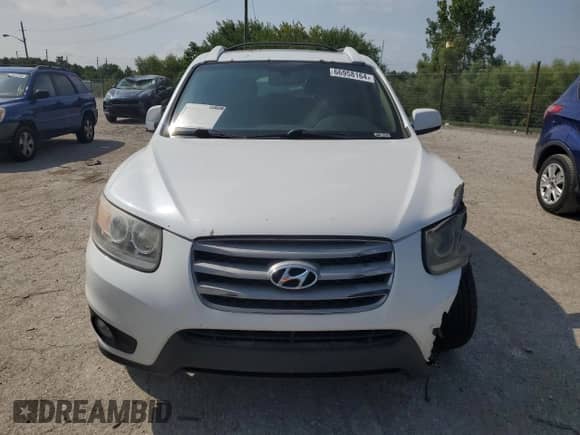 2012 Hyundai Santa Fe Limited с VIN 5XYZK3AB7CG156666, выставлен на аукционе Copart как лот 66958164 с пробегом 135 252 миль миль и На запчасти • Non repairable. История ставок и продаж доступна на DreamBid. Изображение 5.
