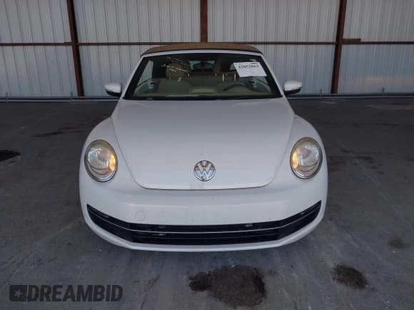 ✅ 2015 Volkswagen Beetle • VIN: 3VW6A7ATXFM823059 • Lot: 42852063. Wystawiony na IAAI z przebiegiem 158 789 mil. Bezpłatny archiwum sprzedaży aukcyjnych z USA i szczegółowy raport historii pojazdu na DreamBid. Zdjęcie 6.