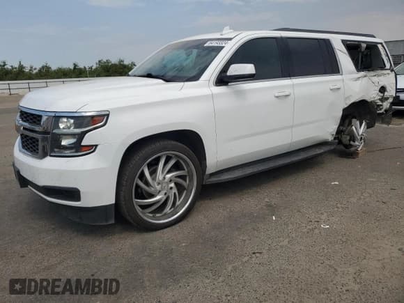 ✅ 2020 Chevrolet Suburban LS • VIN: 1GNSCGEC0LR225957 • Lot: 64193324. Wystawiony na Copart z przebiegiem 82 347 mil. Bezpłatny archiwum sprzedaży aukcyjnych z USA i szczegółowy raport historii pojazdu na DreamBid. Zdjęcie 1.