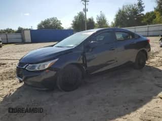✅ 2016 Chevrolet Cruze LS • VIN: 1G1BC5SMXG7236971 • Lot: 85290645. Listed on Copart with 128,090 mi. Free auction sales archive from the USA and detailed vehicle history report at DreamBid. Image 1.