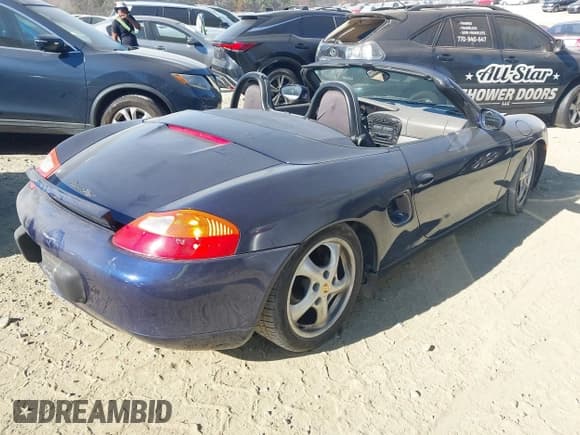 ✅ 2001 Porsche Boxster • VIN: WP0CA29881U624427 • Lot: 43734264. Listed on IAAI with 128,647 mi. Free auction sales archive from the USA and detailed vehicle history report at DreamBid. Image 4.