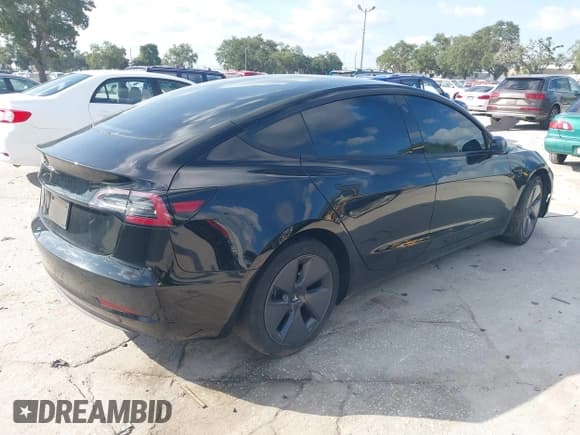 ✅ 2021 Tesla Model 3 Standard Range Plus • VIN: 5YJ3E1EAXMF088276 • Lot: 42932841. Wystawiony na IAAI z przebiegiem Nie podano. Bezpłatny archiwum sprzedaży aukcyjnych z USA i szczegółowy raport historii pojazdu na DreamBid. Zdjęcie 4.