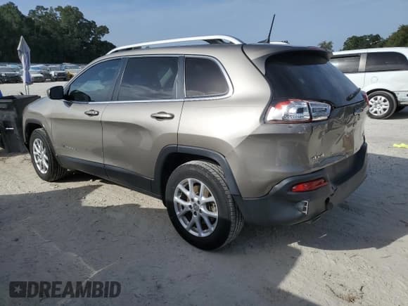 ✅ 2016 Jeep Cherokee Latitude • VIN: 1C4PJMCB8GW296554 • Lot: 84764875. Listed on Copart with 64,170 mi. Free auction sales archive from the USA and detailed vehicle history report at DreamBid. Image 2.