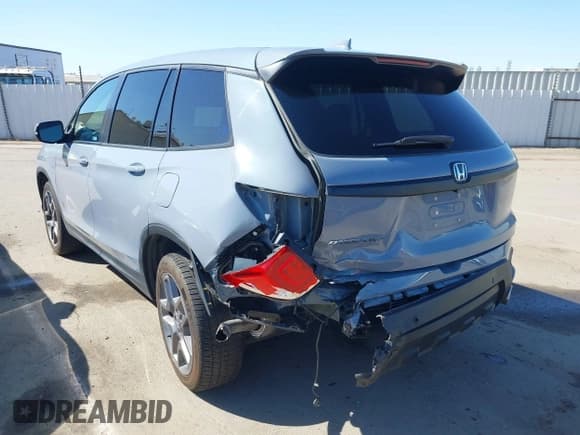 ✅ 2022 Honda Passport EX-L • VIN: 5FNYF7H52NB002772 • Lot: 42322827. Listed on IAAI with 55,798 mi. Free auction sales archive from the USA and detailed vehicle history report at DreamBid. Image 3.