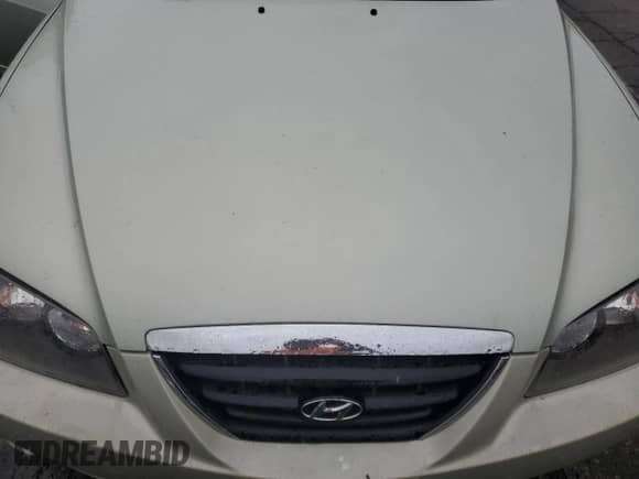 2004 Hyundai Elantra GLS with VIN KMHDN46D44U907025, listed as a Copart auction lot 85393735 with 90,065 mi miles and Salvage title. Bid and sale history available at DreamBid. Image 11.