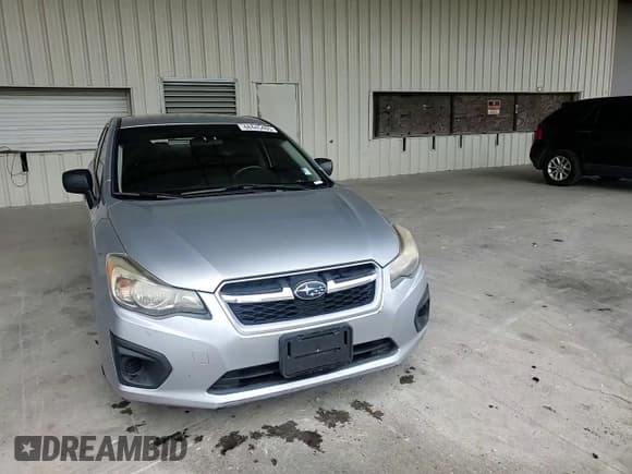✅ 2014 Subaru Impreza • VIN: JF1GJAA63EH018799 • Lot: 68445485. Wystawiony na Copart z przebiegiem 96 048 mil. Bezpłatny archiwum sprzedaży aukcyjnych z USA i szczegółowy raport historii pojazdu na DreamBid. Zdjęcie 13.