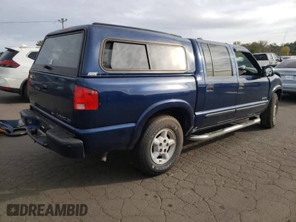 2003 Chevrolet S-10 LS z VIN 1GCDT13X53K125186, wystawiony jako Copart lot #72440074 z przebiegiem Nie podano mil oraz Szkoda całkowita • Salvage title. Historia ofert i sprzedaży dostępna na DreamBid. Obrazek 3.