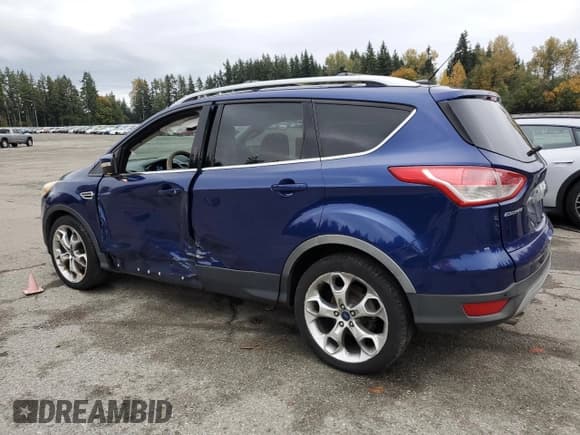 ✅ 2015 Ford Escape Titanium • VIN: 1FMCU0J96FUA14965 • Lot: 90305205. Listed on Copart with 186,714 mi. Free auction sales archive from the USA and detailed vehicle history report at DreamBid. Image 2.