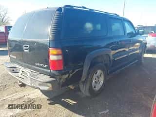 2001 Chevrolet Suburban LT z VIN 3GNEC16T21G213590, wystawiony jako IAAI lot #43454686 z przebiegiem 360 495 mil mil oraz . Historia ofert i sprzedaży dostępna na DreamBid. Obrazek 4.