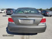 ✅ 2006 Toyota Camry LE • VIN: 4T1BE32K76U680924 • Lot: 86500275. Listed on Copart with 256,718 mi. Free auction sales archive from the USA and detailed vehicle history report at DreamBid. Image 6.