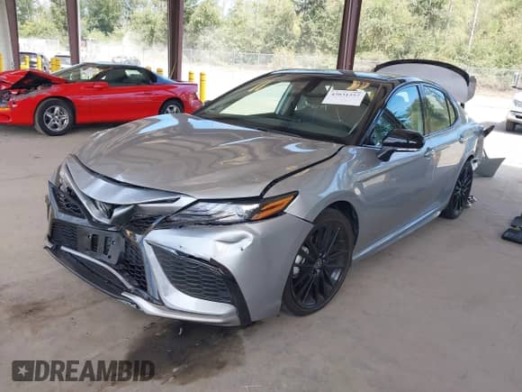2022 Toyota Camry XSE with VIN 4T1K61BKXNU057880, listed as a IAAI auction lot 43031257 with 28,331 mi miles and . Bid and sale history available at DreamBid. Image 18.