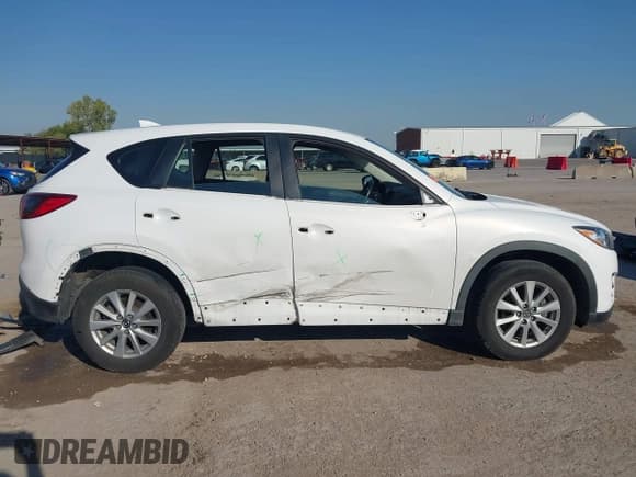 ✅ 2016 Mazda CX-5 Sport • VIN: JM3KE2BYXG0860143 • Lot: 43440842. Wystawiony na IAAI z przebiegiem 83 352 mil. Bezpłatny archiwum sprzedaży aukcyjnych z USA i szczegółowy raport historii pojazdu na DreamBid. Zdjęcie 14.
