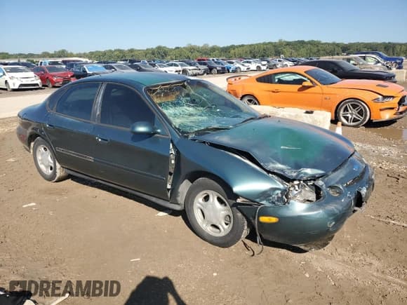 ✅ 1997 Ford Taurus GL • VIN: 1FALP52U5VG258895 • Lot: 82149305. Listed on Copart with 63,867 mi. Free auction sales archive from the USA and detailed vehicle history report at DreamBid. Image 4.